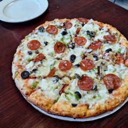 Nick's Restaurant - Around The World Pizza