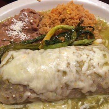 Tacos Sinaloa - Carnitas wet burrito with green sauce and a side of rice and beans - Mexican Near Me - Santa Ana, California