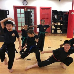 Martial arts kids having fun in the Dojo