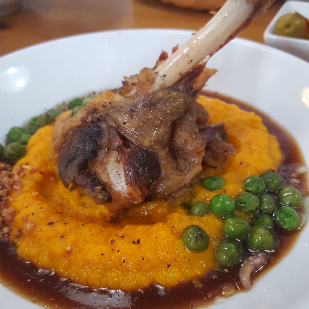 La Brunilda - Duck confit with sweet potato puree. - Tapas Bars Near Me - Seville, SE La Brunilda - Duck confit with sweet potato puree. - Tapas Bars Near Me - Seville, SE