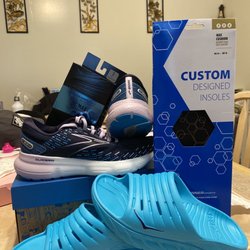 Road Runner Sports - Brooks Glycerin, custom insoles ( a must have) cushy socks and some house shoes.
