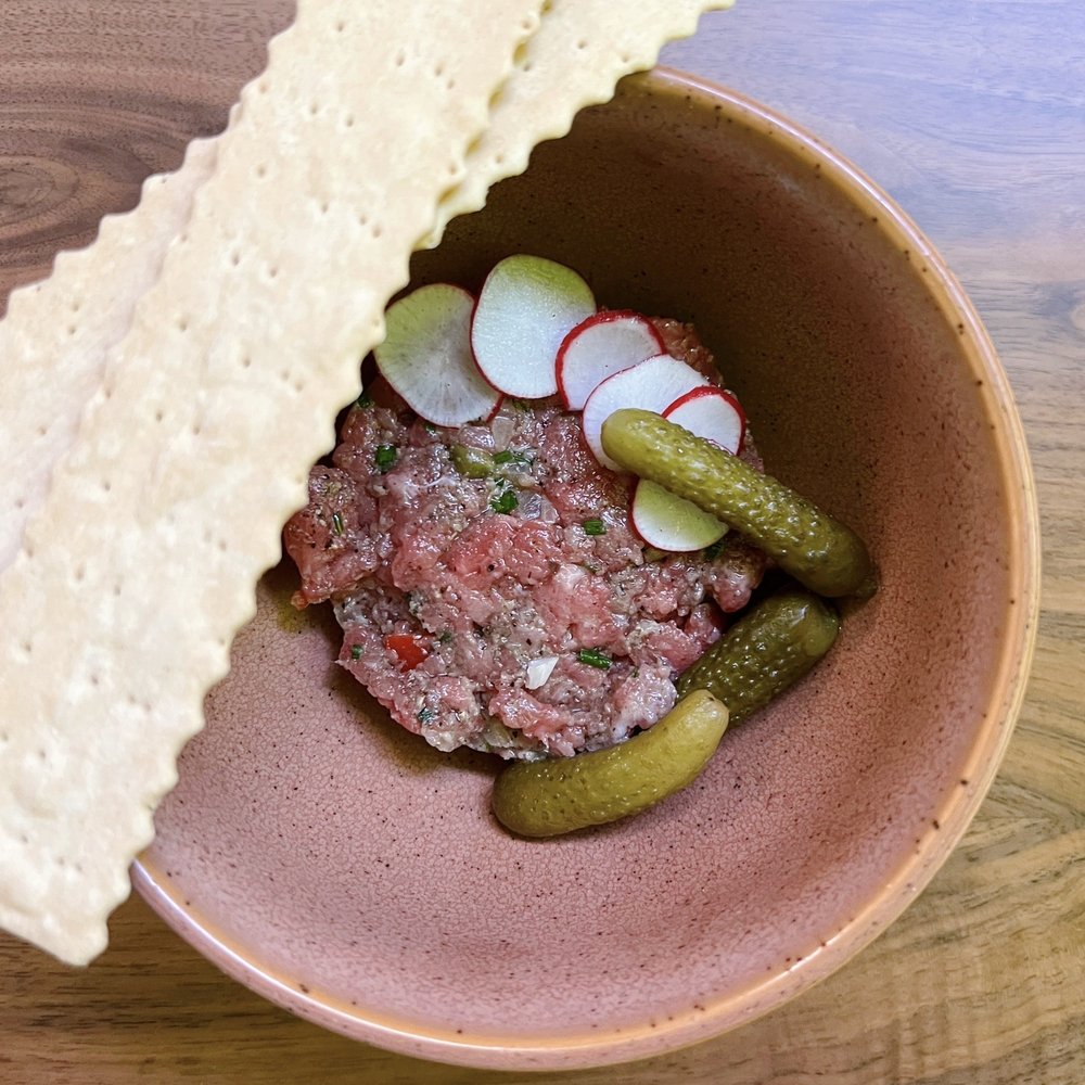 The Rustic - Truffle Steak Tartare w/ sirloin, black truffle paste, capers, pickled peppers | $18 - Italian Near Me - San Francisco, California The Rustic - Truffle Steak Tartare w/ sirloin, black truffle paste, capers, pickled peppers | $18 - Italian Near Me - San Francisco, California