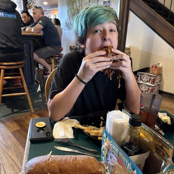 Lost Coast Brewery and Cafe - My teen got the Cowboy Burger and my husband's Philly Cheesesteak is also pictured here next to me. - Pubs Near Me - Eureka, California