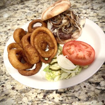 Rustler's Restaurant - Mushroom Swiss Burger with onion rings - American Near Me - Tropic, Utah Rustler's Restaurant - Mushroom Swiss Burger with onion rings - American Near Me - Tropic, Utah