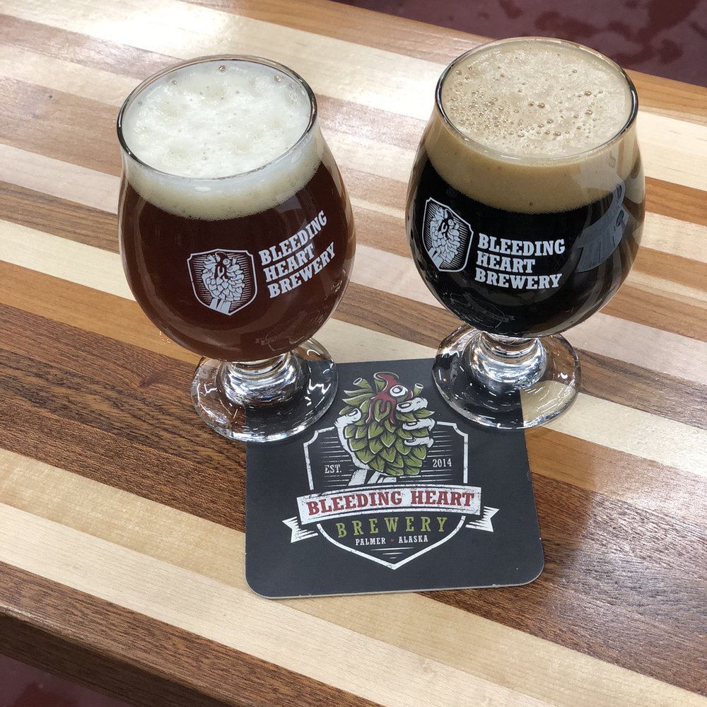 Bleeding Heart Brewery - Rotten hood (left): English Burton ale aged in a 4 Roses bourbon barrel. Ominous hippopotamus - Breweries Near Me - Palmer, Alaska