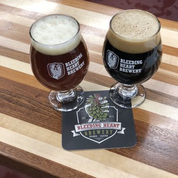 Bleeding Heart Brewery - Rotten hood (left): English Burton ale aged in a 4 Roses bourbon barrel. Ominous hippopotamus - Breweries Near Me - Palmer, Alaska