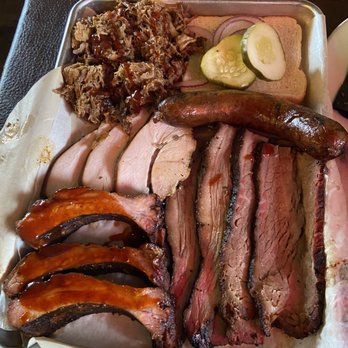 Colt Grill - Sampler platter- ribs, pulled pork, turkey brat, turkey, and brisket - Barbeque Near Me - Sedona, Arizona Colt Grill - Sampler platter- ribs, pulled pork, turkey brat, turkey, and brisket - Barbeque Near Me - Sedona, Arizona