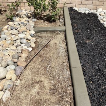 Kwik Kerb by Guido - a garden with rocks and gravel - Landscape Architects or Designers Near Me Kwik Kerb by Guido - a garden with rocks and gravel - Landscape Architects or Designers Near Me