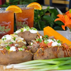 Petro's Chili & Chips-West Hills - How do you like your baked potato? We hope you like them HUGE, heaped high with toppings and piping hot!