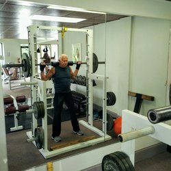 Energize Personal Training - 82 year old squats 185 lbs.