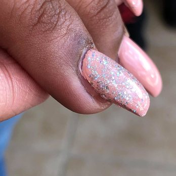 Jacqueline's Nail Salon - Poorly polished and crooked you can see the side of the real nail. - Nail Salons Near Me - Riverside, Illinois