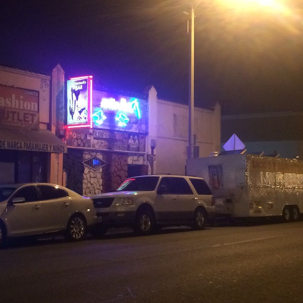 Margaritas - a row of parked cars in front of a neon sign - Food Trucks Near Me - Los Angeles, California