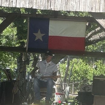 The Grapevine - Slim Bowb playing some great music on the grapevine yard. - Beer Gardens Near Me - New Braunfels, Texas