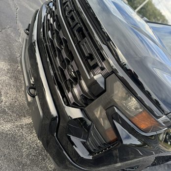 Pro Dips - Gloss Black tinted taillights, chrome delete, Grille, and gloss black rims on this 2023 Chevrolet Silverado - Vehicle Wraps Near Me - Orlando, Florida Pro Dips - Gloss Black tinted taillights, chrome delete, Grille, and gloss black rims on this 2023 Chevrolet Silverado - Vehicle Wraps Near Me - Orlando, Florida