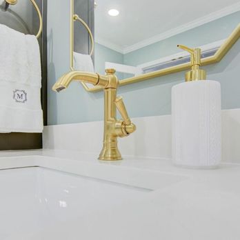 Ico Construction - a bathroom sink with a gold faucet - General Contractors Near Me - San Jose, California Ico Construction - a bathroom sink with a gold faucet - General Contractors Near Me - San Jose, California