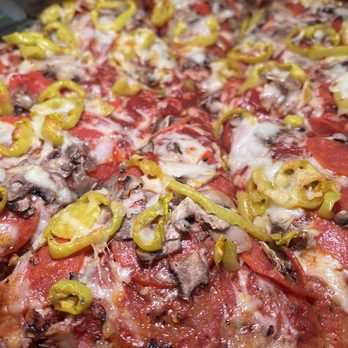 Satchel's Pizza - The Satch pan pizza with pepperoni, mushrooms and banana peppers - Pizza Near Me - Gainesville, Florida