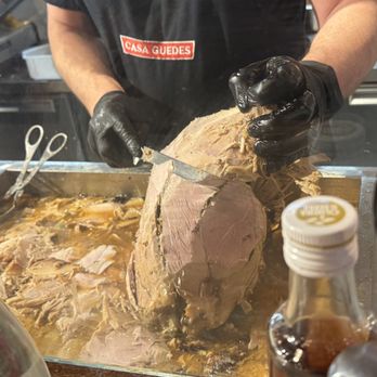 casa guedes - Pork being carved and soaked in the jus. - Sandwiches Near Me - Porto, 13