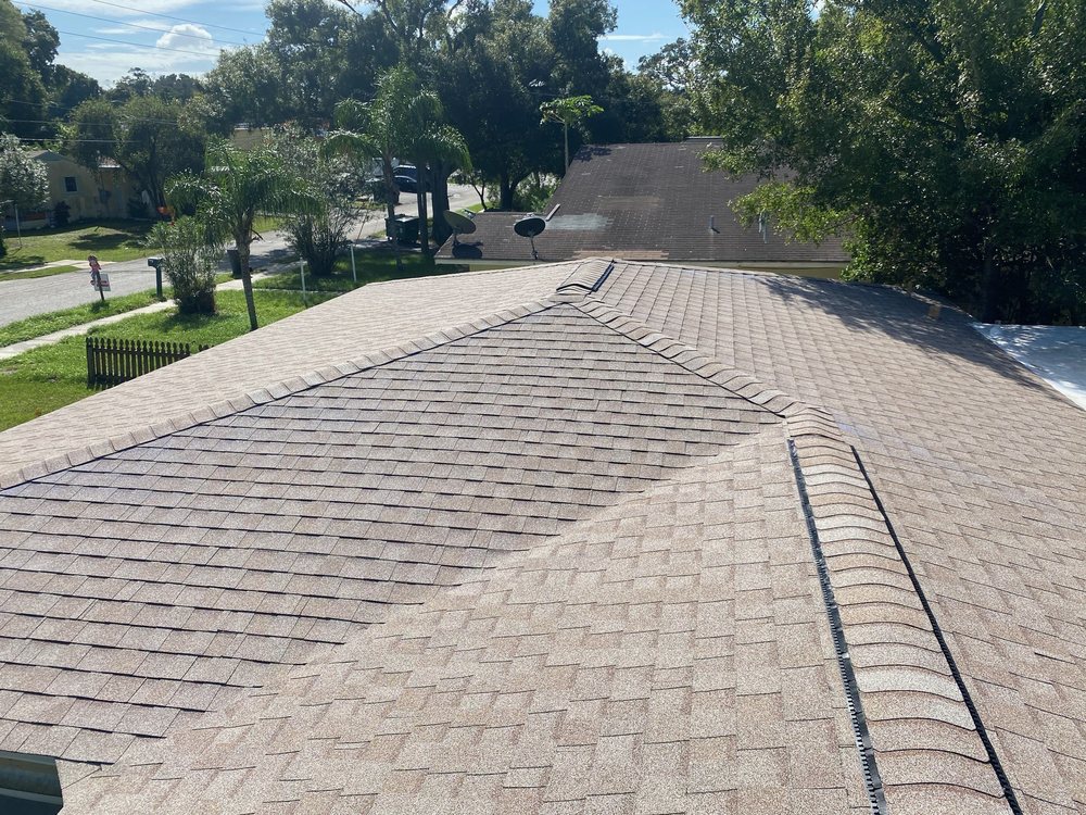 Slide of T and G Roofing