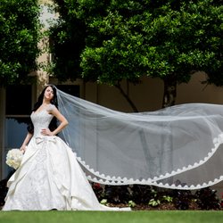 Chantelia Couture & Alterations - Wedding dress alteration from size 12 to zero with a custom made veil.
