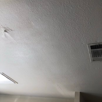 183 Professional Roofing & Painting - Before picture of leak in kitchen. - Painters Near Me - Austin, Texas 183 Professional Roofing & Painting - Before picture of leak in kitchen. - Painters Near Me - Austin, Texas