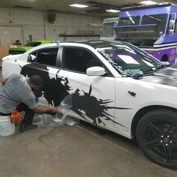 Just Tint & Signs - Leon working on my custom mopar design 1st time around - Car Window Tinting Near Me - Baltimore, Maryland Just Tint & Signs - Leon working on my custom mopar design 1st time around - Car Window Tinting Near Me - Baltimore, Maryland