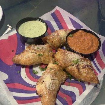 Mellow Mushroom Brandon - Pizza roll things with pesto sauce and vodka sauce - Pizza Near Me - Brandon, Florida Mellow Mushroom Brandon - Pizza roll things with pesto sauce and vodka sauce - Pizza Near Me - Brandon, Florida