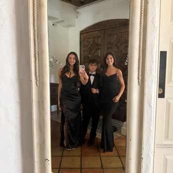 A M Henry Dress Studio - I'm the one holding the phone! - Sewing & Alterations Near Me - San Pedro, California