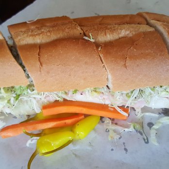 The Sub Station - The Big Dude! House signature sub since 1972. $10.75, cut into quarters. - Sandwiches Near Me - Riverside, California The Sub Station - The Big Dude! House signature sub since 1972. $10.75, cut into quarters. - Sandwiches Near Me - Riverside, California