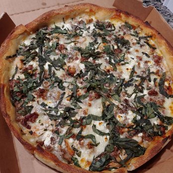 Star Pizza - Large deep dish chicken Alfredo pizza, with basil. We subbed the gorgonzola for goat cheese and added Italian sausage. - Pizza Near Me - Houston, Texas
