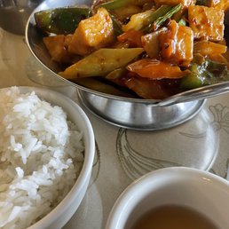With tea and rice