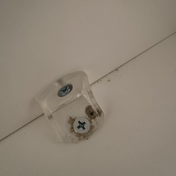 Closets by Design - Milwaukee - Drilled hole in wrong spot so just drilled another hole - Flooring Near Me - Mequon, Wisconsin