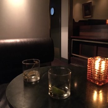 Bar Plan B - a glass of water and a lit candle on a table - Cocktail Bars Near Me - Montreal, Quebec Bar Plan B - a glass of water and a lit candle on a table - Cocktail Bars Near Me - Montreal, Quebec