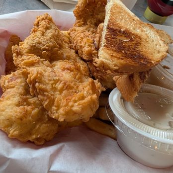 Novrozsky's Hamburgers - Regular basket of chicken tenders, fries and gravy and toast - Burgers Near Me - Vidor, Texas Novrozsky's Hamburgers - Regular basket of chicken tenders, fries and gravy and toast - Burgers Near Me - Vidor, Texas