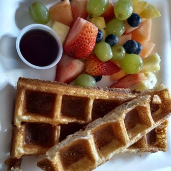 Moore Coffee Shop - Close up of long classic waffles and fruits - Coffee & Tea Near Me - Seattle, Washington
