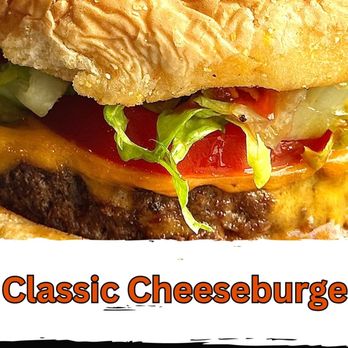 Ms. Tilly's Lavish Kitchen - This classic burger is a juicy hamburger patty, melted America cheese, lettuce, tomatoes, and red onions, all on a toasted bun. - New American Near Me - Detroit, Michigan Ms. Tilly's Lavish Kitchen - This classic burger is a juicy hamburger patty, melted America cheese, lettuce, tomatoes, and red onions, all on a toasted bun. - New American Near Me - Detroit, Michigan