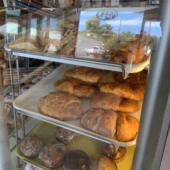 Dos Palos Donuts - a display of baked goods - Donuts Near Me - Dos Palos, California