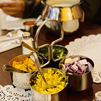 Kathiyawadi Kitchen - a variety of dishes on a table - Indian Near Me - Sayreville, New Jersey Kathiyawadi Kitchen - a variety of dishes on a table - Indian Near Me - Sayreville, New Jersey