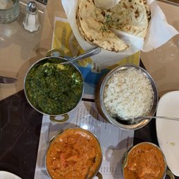 Butter chicken, chicken tiki masala, saag, garlic naan Butter chicken, chicken tiki masala, saag, garlic naan