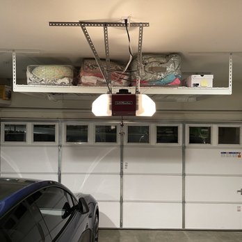 The Clever Home - garage rack storage overhead - Home Organization Near Me