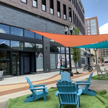 Foster Coffee Company - Outdoor community seating at Foster Coffee Co - Coffee & Tea Near Me - East Lansing, Michigan