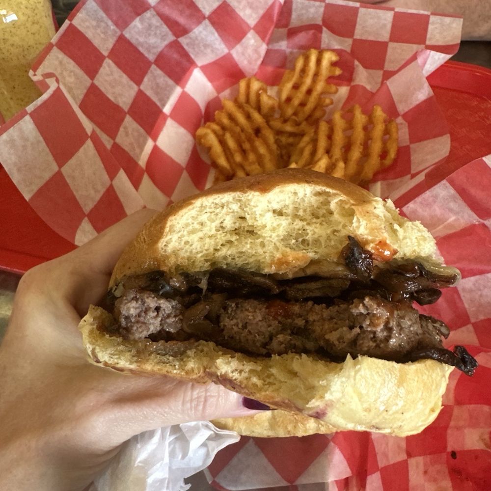 Mushroom Swiss burger and waffle fries