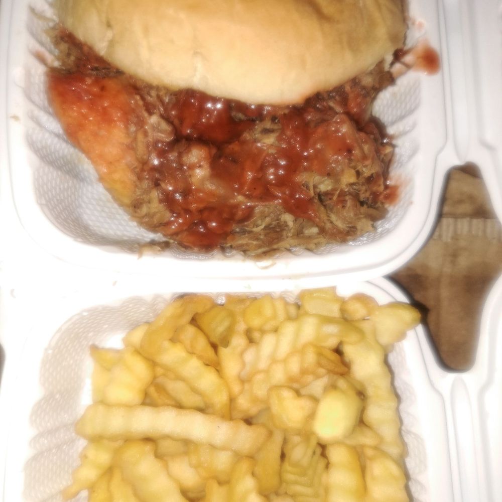 Pulled beef BBQ sandwich and yes the bun is soggy Pulled beef BBQ sandwich and yes the bun is soggy