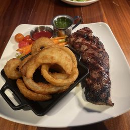 12 oz New York Strip w/ onion rings 12 oz New York Strip w/ onion rings