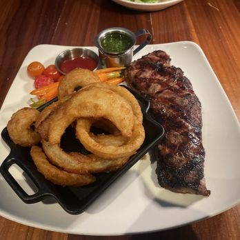 Kites Restaurant - 12 oz New York Strip w/ onion rings - New American Near Me - Vernon, New Jersey Kites Restaurant - 12 oz New York Strip w/ onion rings - New American Near Me - Vernon, New Jersey