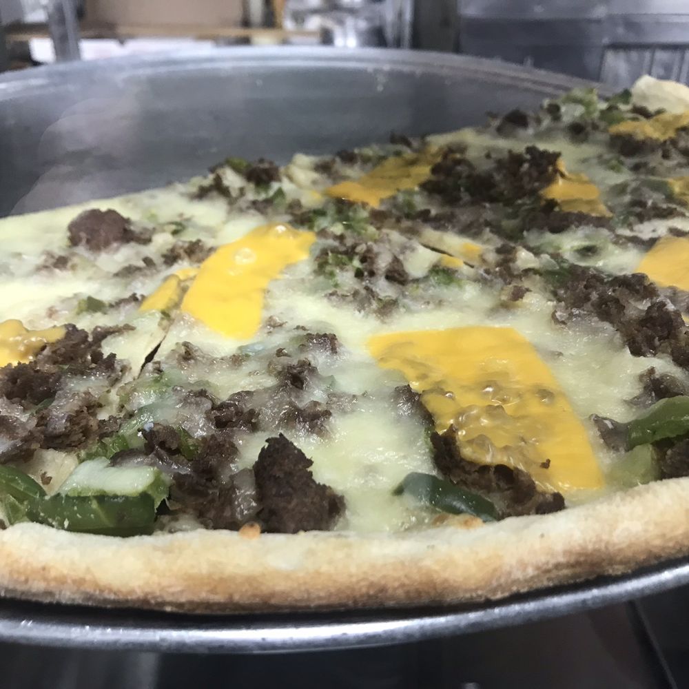 Brooklyn's Pizza - a close up of a pizza - Italian Near Me - Irvington, New Jersey