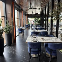 The H Orlando - Another side of the patio dining seating