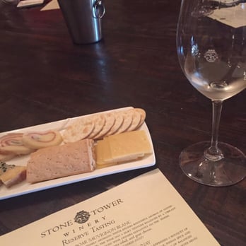 Stone Tower Winery - Assorted cheese plate with tasting glass and menu - Wineries Near Me - Leesburg, Virginia Stone Tower Winery - Assorted cheese plate with tasting glass and menu - Wineries Near Me - Leesburg, Virginia