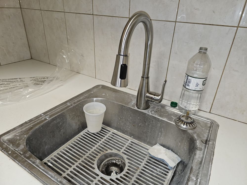 Slide of The Faucet Experts