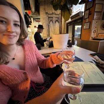 Osteria Brooklyn - Me and my girlfriend, Shannon, sitting at the bar. - Italian Near Me - Queens, New York