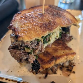 Broken Spirits-Anaheim - Chimichurri Sandwich with chips - Cocktail Bars Near Me - Anaheim, California